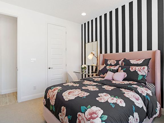 Second bedroom with a spacious closet and convenient access to the secondary bath.