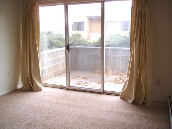 Large patio with sliding doors exiting to the patio