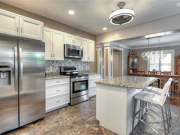 Remodeled kitchen with granite counter tops
