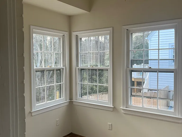 windows in sunroom with tile floor