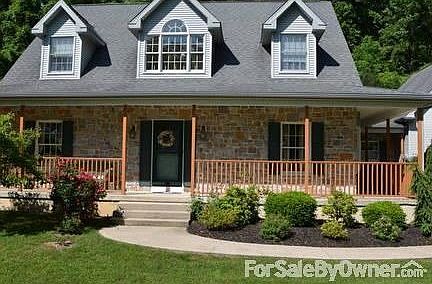 Front of House
						:
						house exterior is stone and gray vinyl, well maintained