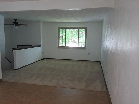 Brand New Wall to Wall throughout home, new hard wood in Dining room
