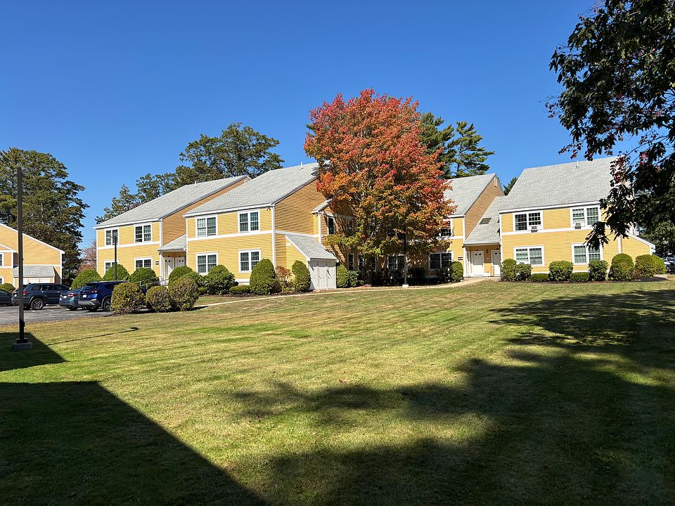 Front of condo and parking area