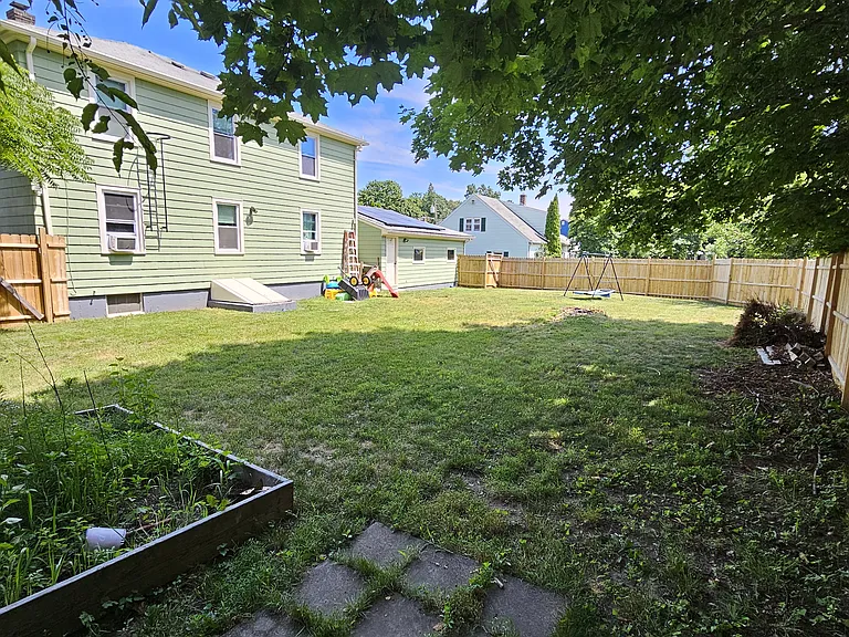 Fully fenced backyard