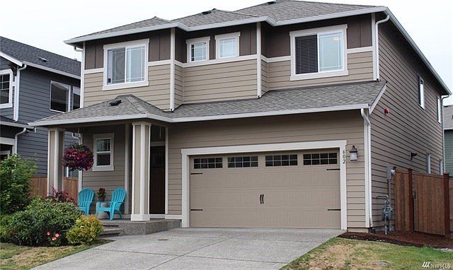 Attractive Westside 4 bedroom home with open great room design!  Dream kitchen with adjoining gathering room plus flex space/office nook area.