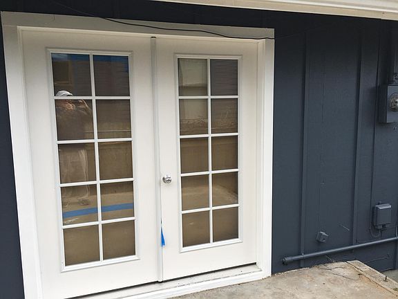 French doors open from the kitchen and dining area onto a Southwest facing patio.