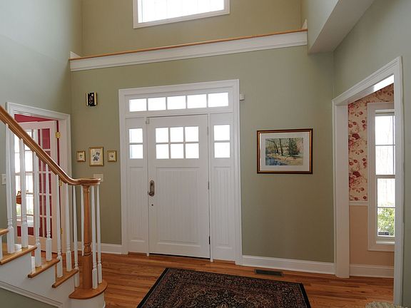 Foyer with motorized chandelier