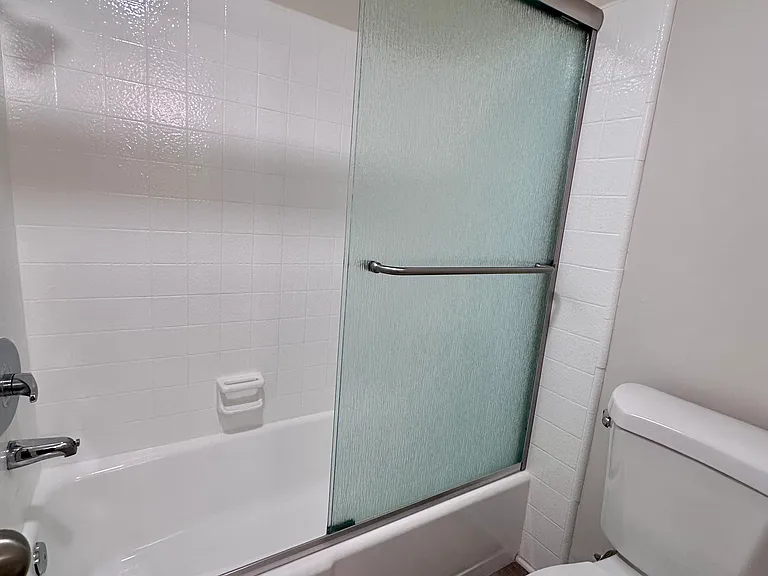 Second bathroom toilet and shower/ tub