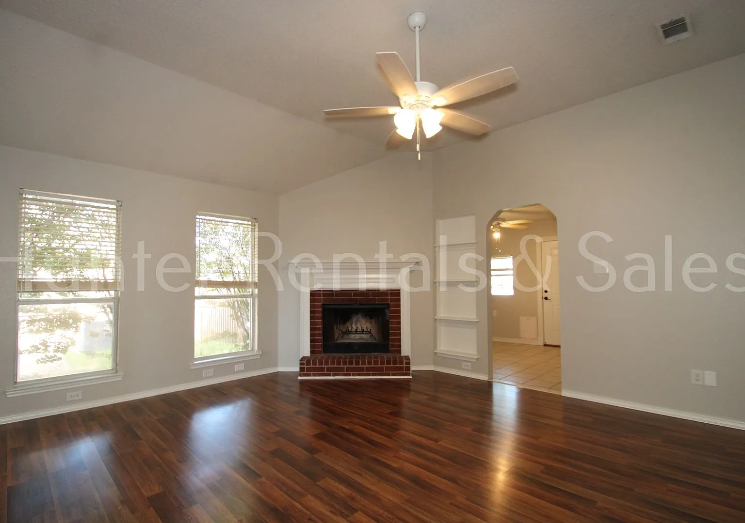 Exceptional Living with Vaulted Ceilings, Cozy Fireplace & Expansive Outdoor Space — Photo 3