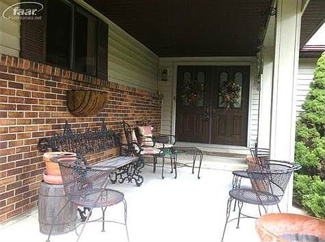 Large covered front porch, perfect for watching those summer thunderstorms!