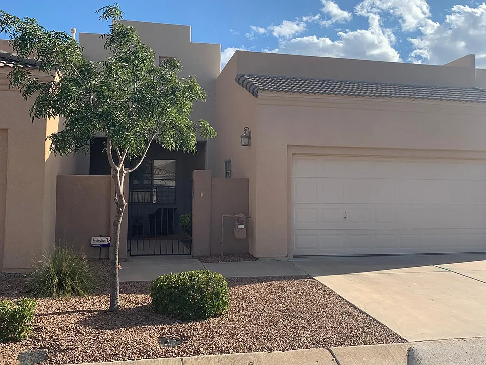 Two-car garage with remote access via smart phones; hand-held remote also available.