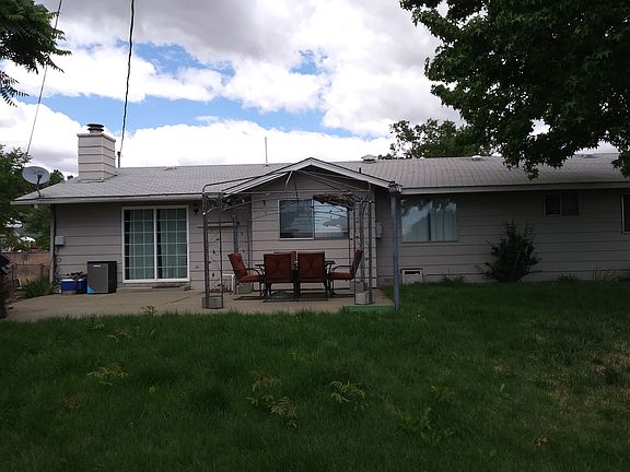 Large back patio with sliding doors