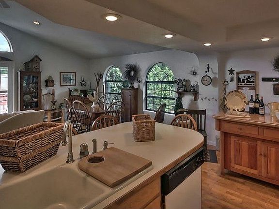 Kitchen with Eating Space overlooks Large Family and Dining Room