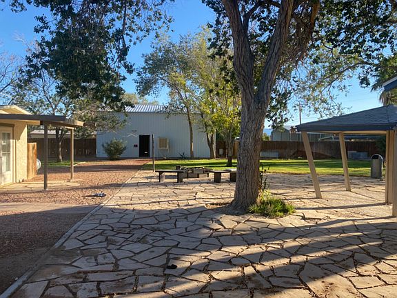 looking out dining room window toward workshop, casita on left