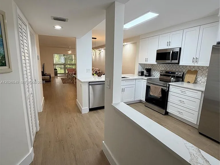 7350 Kinghurst Dr #305 — Photo 23