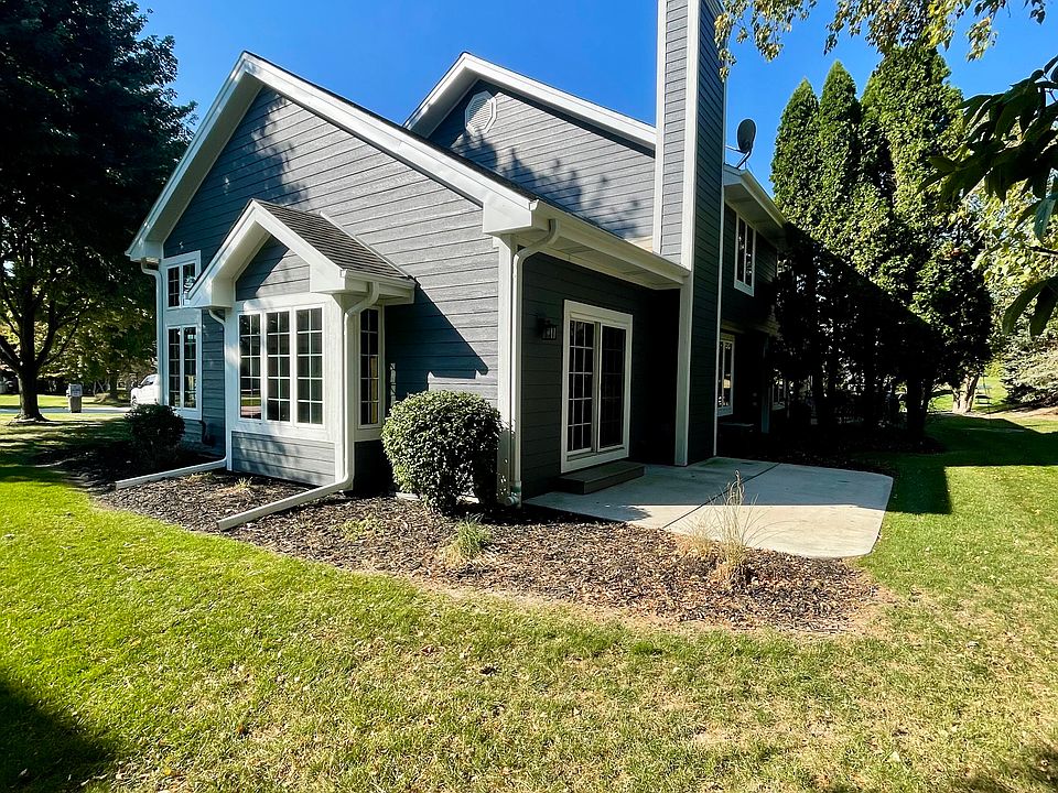 side yard and private concrete patio