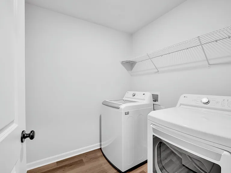 Upstairs laundry area- with washer and dryer included.