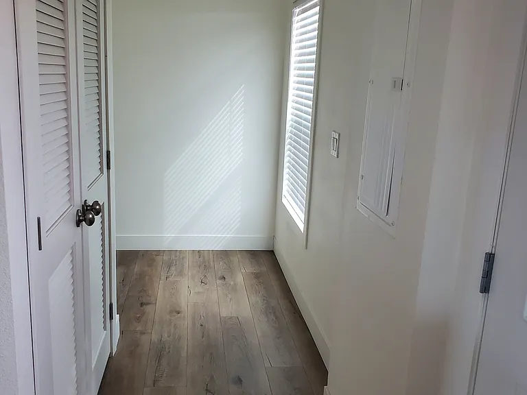 HALLWAY TO LAUNDRY AREA