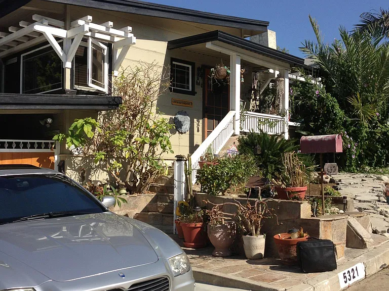 front of house with downstairs studio apt