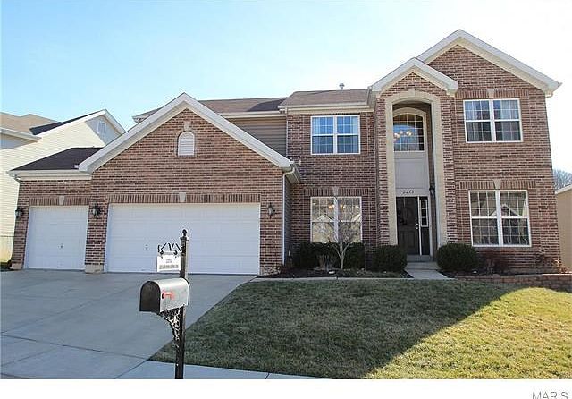 Curb appeal at its best! Professionally landscaped & maintained w/ irrigation system.