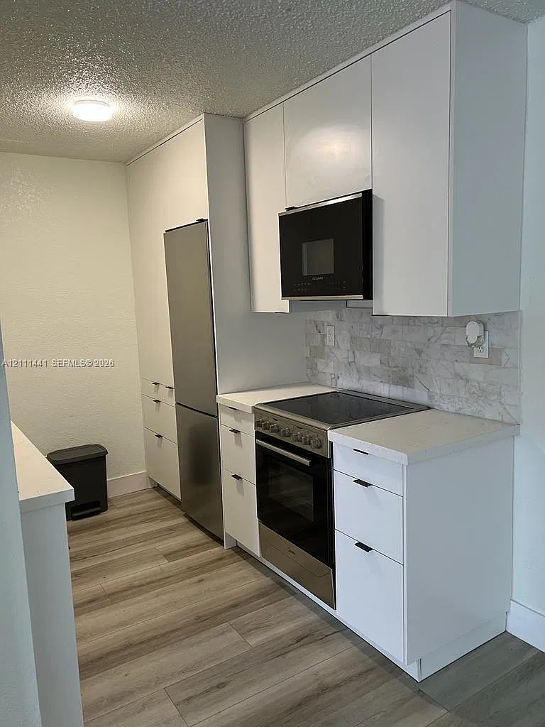 444 SW 4th St — Photo 4