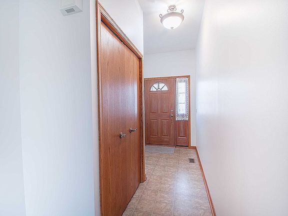 Foyer with a double closet