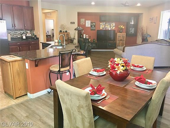 Highly desired great room living includes large kitchen, dining, and spacious family room, combined.  Notice the newer wood floo