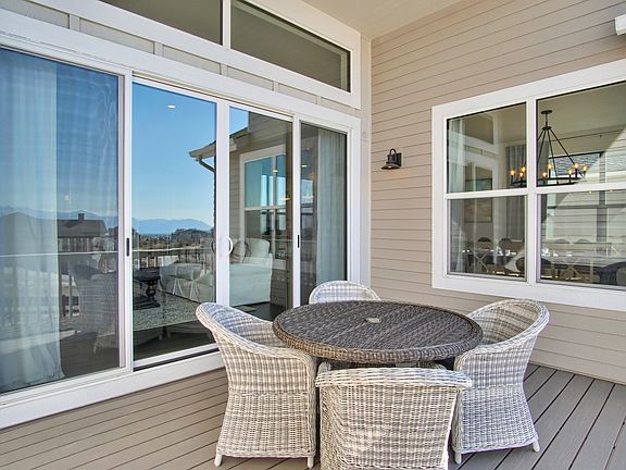 Covered Deck Option Photo representing home to be built and may demonstrate optional features