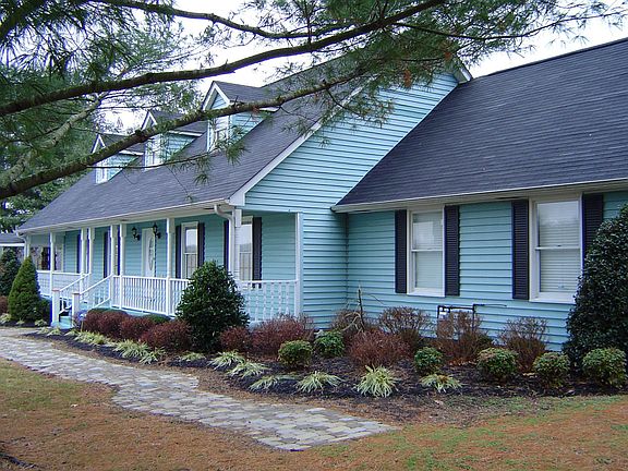 Nice landscaping adds an elegant touch.