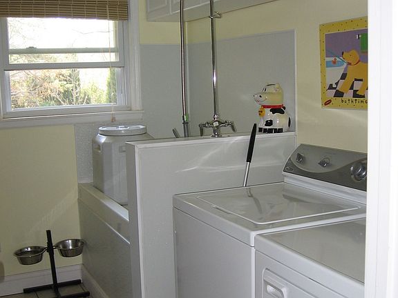Laundry Room with Doggy Shower!