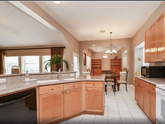 Kitchen with breakfast nook that opens into the study