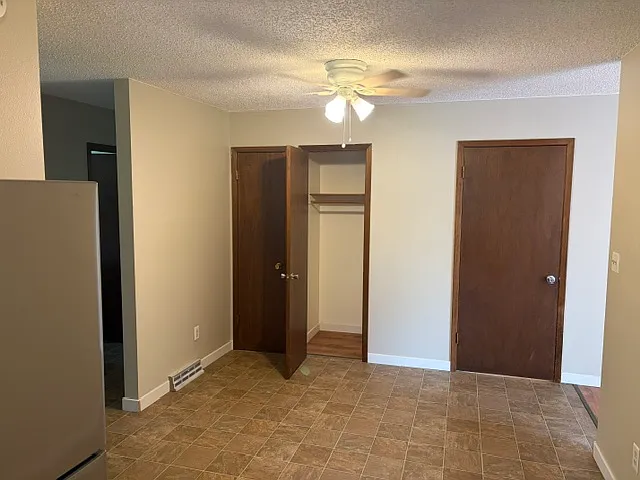 Kitchen -- space for table and storage/closet, ceiling fan
