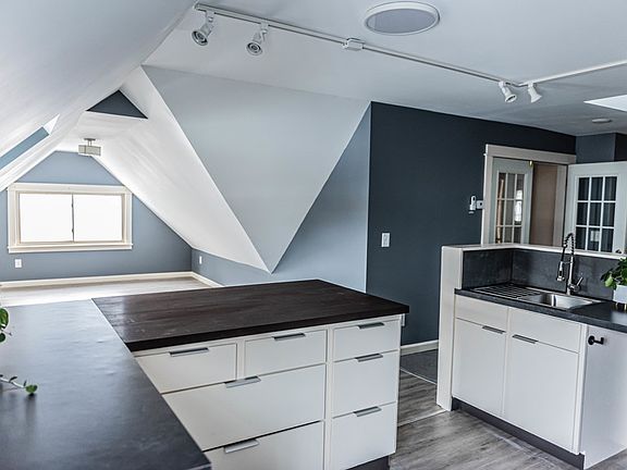 Kitchen looking into dining/living space