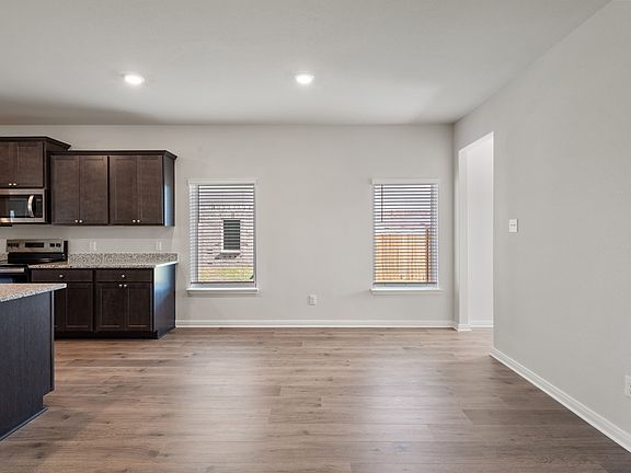 The dining room sits right off of the kitchen.