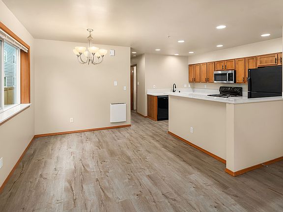 Dining space with kitchen and eat bar