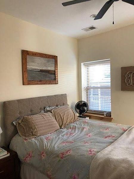Bright corner bedroom with double door closet & private bath