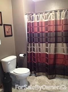 Bathroom
						:
						Attached to room with cabinets and double vanity, walk through to master bed