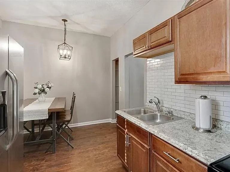 Eat in kitchen with subway tile backsplash