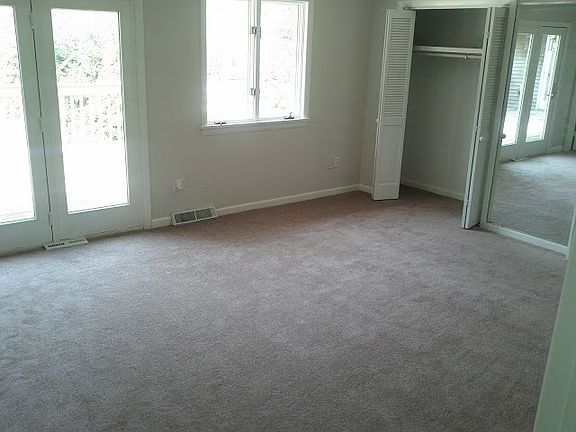 Master Bedroom with glass door leading to deck. Master bedro