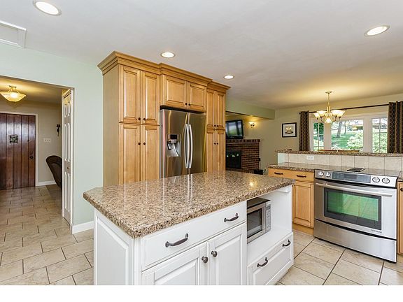 Updated kitchen with glazed maple cabinets