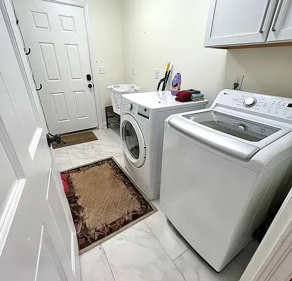 Laundry room with washer/dryer included