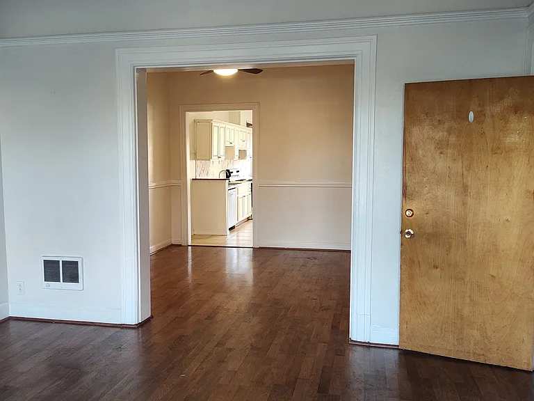 livingroom standing in front of bay windows