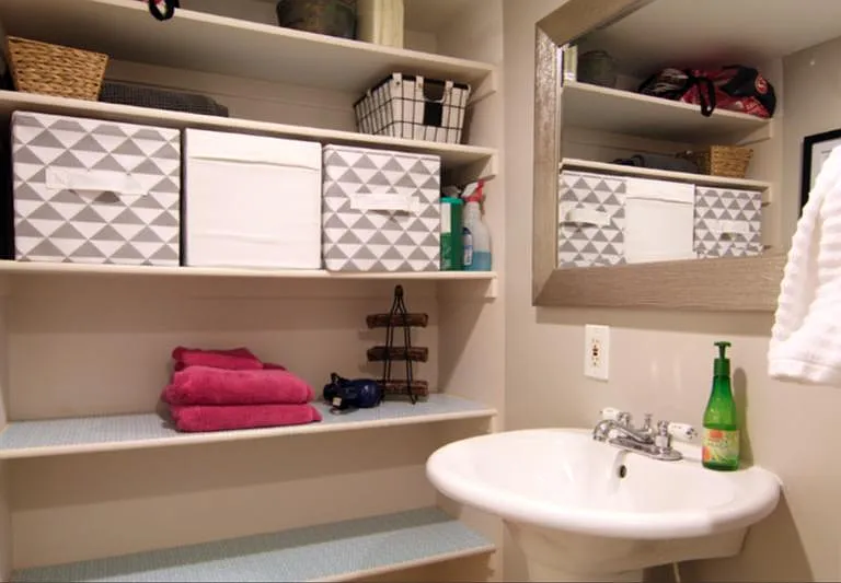 ample storage shelves in bathroom