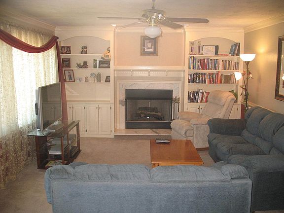 Spacious Family Room with gas fireplace and built-ins!