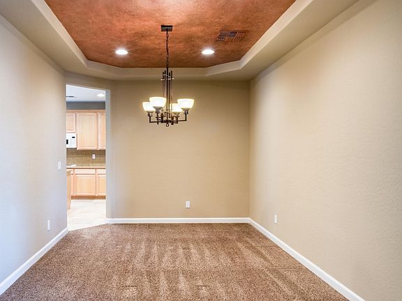 Dining room w/designer styled ceilings