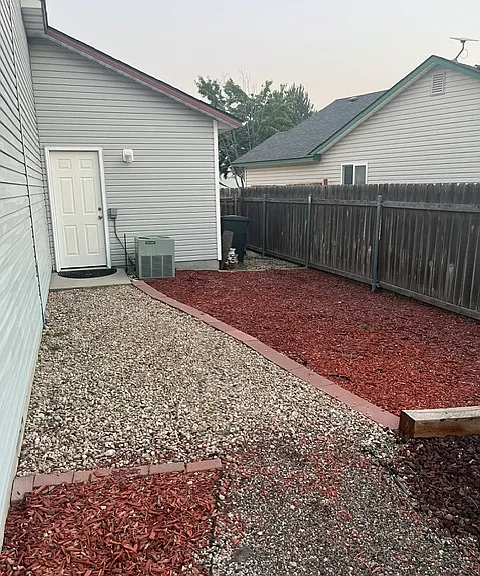 Back door to garage off the side of house. Plenty of extra project space!