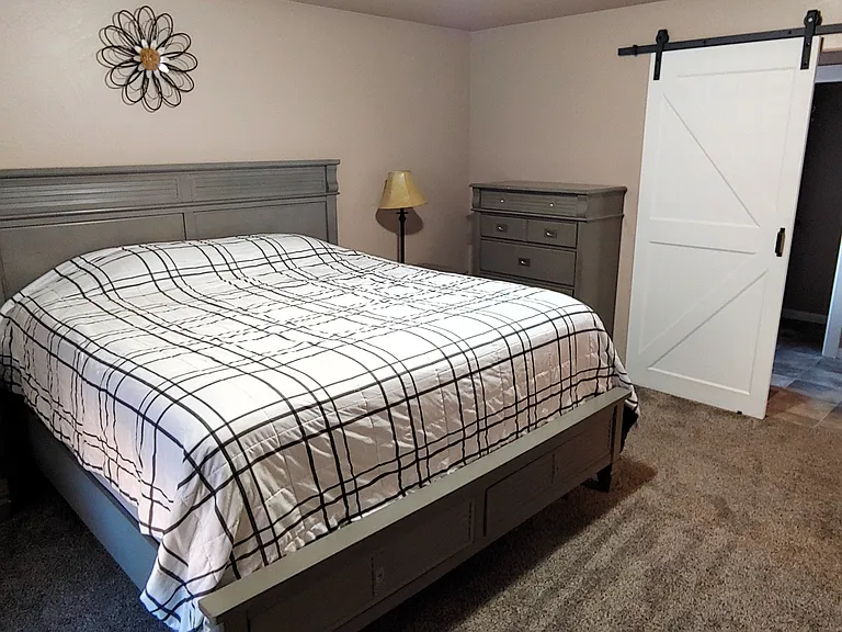 Master bedroom (camera picked up odd glare at doorway).