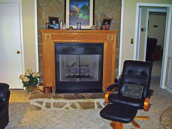 This home has a cozy fireplace in the livingroom