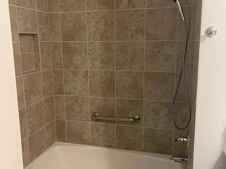 Full sized tiled tub