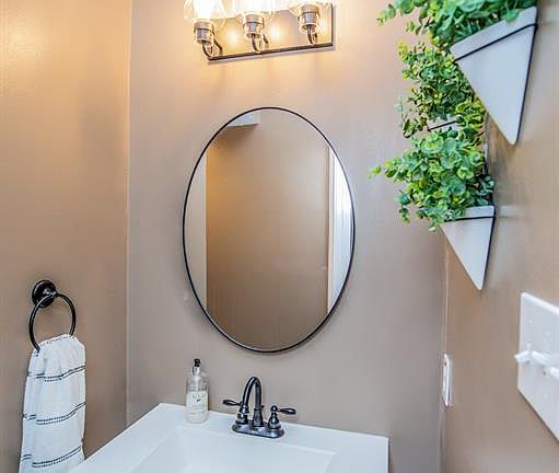 Half bath located on 1st floor. Fresh paint and new faucet